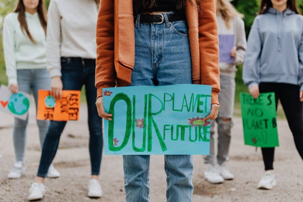 young people protesting breaking the social contract